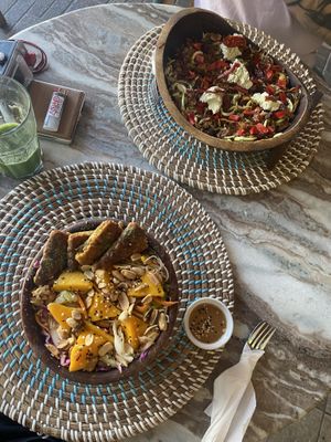 Rainbow tempeh salad in front and Endless summer in the back with shine on juice  at The Vegan Lab in Dahab