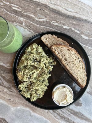 Activated pumpkin seed scramble, cashew ricotta, and sourdough  at The Vegan Lab in Dahab