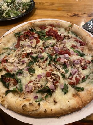 Spinach and mushroom with added onion and sundried tomatoes   at Great White Pizza in Panama City Beach