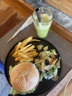 Sweet potato burger 🍔   at Smooth Cafe in Moalboal