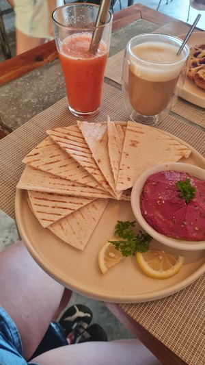 Beetroot-Hummus with Bread, Watermelon Mango Juice and Latte Macchiato with Oatmilk at Smooth Cafe in Moalboal