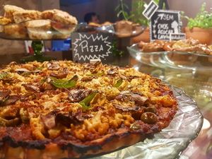 Pizza is the best snack! at Semente - Art - Coffee & Plant Based Food in Braga