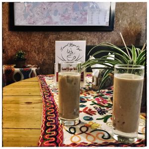 Date me Luv -- A date smoothie packed with almond, banana, and date goodness! at Travel Yoga Cafe in New Delhi