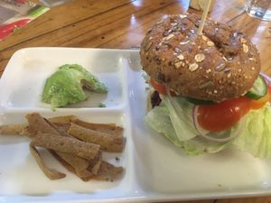 Beet burger with multigrain bun. Finest bun I ever ate   at Travel Yoga Cafe in New Delhi