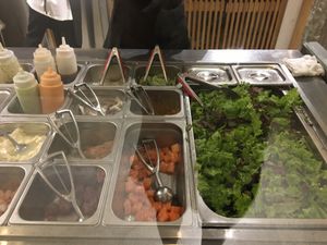 Salad and protein options at Poke Hanoi in Hanoi