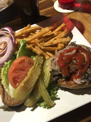 Veggie burger with sautéed mushrooms and onions at The Yucatan Beach Stand in Fort Myers Beach