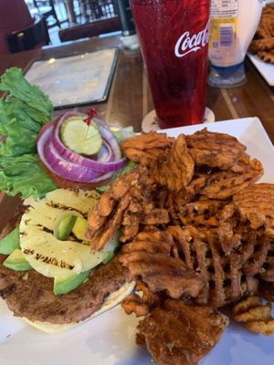 Impossible Burger on Wheat Bun with added Avocado, added Pineapple, and Sweet Potato Fries at The Yucatan Beach Stand in Fort Myers Beach
