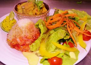 Sweet potato , chick pea and smoked tofu curry in a fruity coconut  sauce served with wild rice and garden fresh salad, vegan and gluten free at The Phoenix Vegetarian Restaurant & Accommodation in Castlemaine