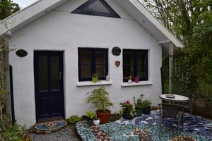 self ctering chalet with pellet burner at The Phoenix Vegetarian Restaurant & Accommodation in Castlemaine