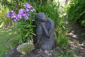 Take a break from sightseeing and relax in the beautiful gardens at The Phoenix Vegetarian Restaurant & Accommodation in Castlemaine