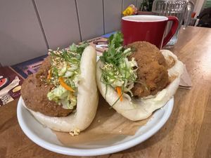 ‬
‭ 5 SPICE‬‭ LION’S‬‭ MANE‬‭ BAO (I think) I had the waitress surprise me with all choices but they were all vegan.  at Gongfu Bao in Ottawa