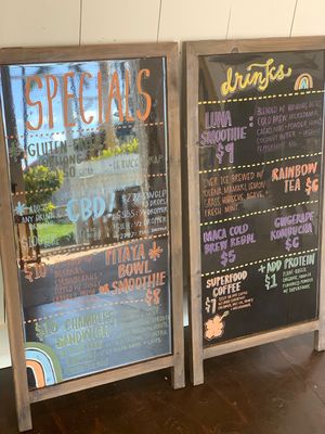 Specials and palm trees at Raised by the Waves  in Kahuku