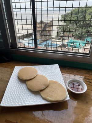 Vegan pancakes and maple syrup   at Aadha-Aadha Café in Varanasi