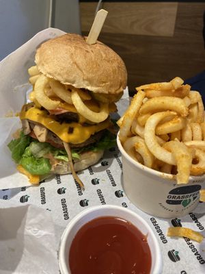 B.F.C. (Double vEEF patty, double vCheese, vBacon, curly fries, mushroom, caramelised onion, tomato, lettuce, pickles, sauce) at GrassfedVegan in South Brisbane