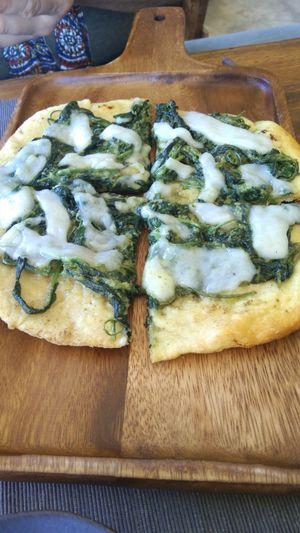 Flatbread with spinach and 'mozzarella' at Gecko Republic Jungle Cafe in Koh Tao
