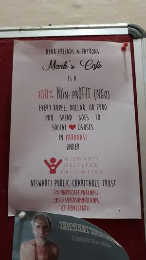 Their non-profit activity at Mark's Cafe in Varanasi