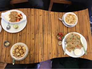 Our breakfasts: porridge, muesli and savoury pancakes - all fabulous! at Mark's Cafe in Varanasi