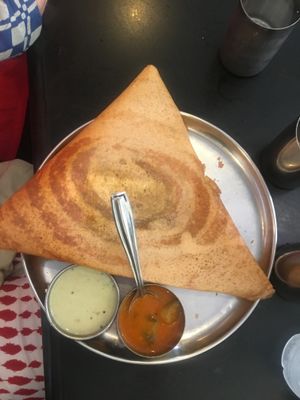 Mysore masala dosa with sambar (red sauce) and coconut chutney (white sauce) at Hotel Shanthi Sagar in Udupi