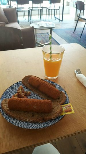 Croquettes and fresh orange juice ❤ at Fast & Vegan in The Hague