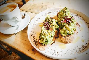 Smashed avocado 🥑 on sourdough toast with a coconut latte  at Jaunty Goat Coffee - Northgate St in Chester