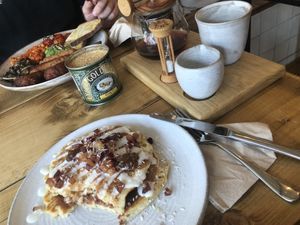 Excuse the already eaten pancakes! I could not help myself before taking a photo! at Jaunty Goat Coffee - Northgate St in Chester