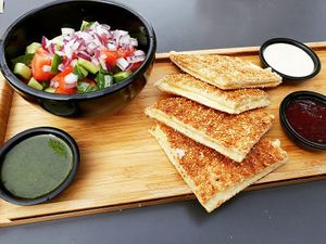 vegan toasts with salad at Cafe Cafe in Haifa