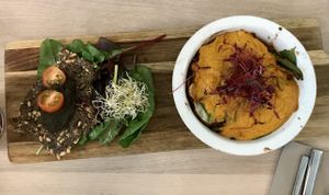 Lasagne with greens, seed crackers and dip at Stem & Glory in London