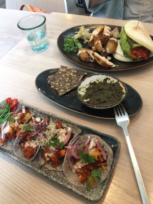 Jackfruit bao, Jackfruit taco, seed cracker and nori tapenade at Stem & Glory in London