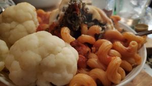Corkscrew pasta with Quinoa Ball topped with Vegan cheese, served with steamed cauliflower at Mezzo Italiano in Cambria