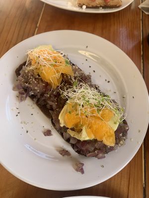 Carmalizes onion toast  at Amaranto in Tulum