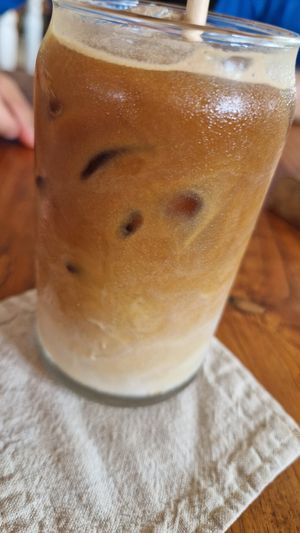 Iced latte with oatmilk at Kenza in 