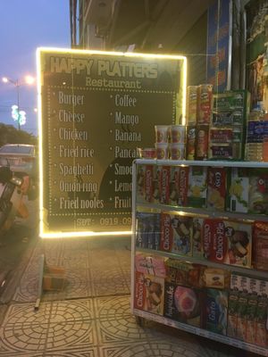 The restaurant is visible on the right side of the street as you leave the train station and stands out with its English-language sign board. at Happy Platters in Dong Hoi