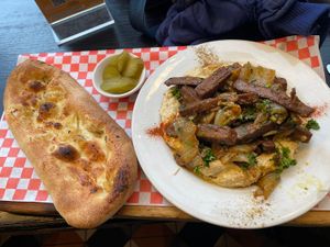 Hummus plate with focaccia upgrade 25 #Veganuary at Cafe Landwer - University Ave in Toronto