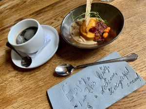 Sea buckthorn cream and an americano  at Rataskaevu 16 in Tallinn