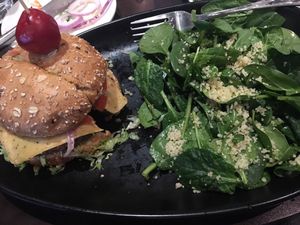 Vegan Burger/cheese and spinach salad.  at CRAVE in Roseville