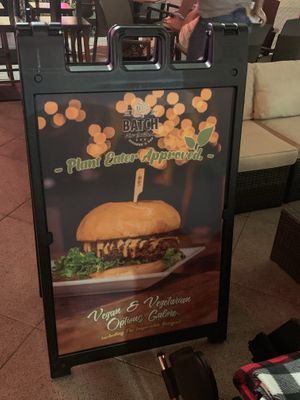 Large sign on the street welcoming people who want plants to eat 😎 at Batch in West Palm Beach