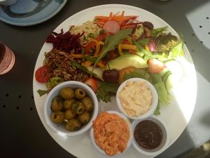 Deli selection with garlic olives, red pepper and basil pâté & carrot and cashew pâté at The Green Way Cafe in Matlock