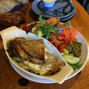 Snack sized vegan spinach and mushroom pancakes with assorted salad. at The Green Way Cafe in Matlock