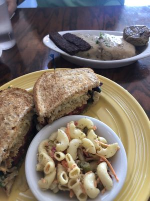 Vegan Rueben with vegan Mac salad and vegan biscuits and gravy with vegan sausage and bacon. Both were amazing! at Wildflower Cafe and Bakery in Arcata