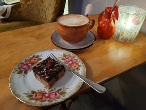 Cake and oat latte at Criollo Chocolate Café in Drammen