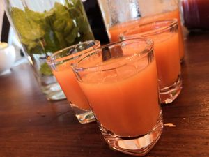 Carrot-apple-ginger shots at brunch  at Bean There Cafe in Helsinki