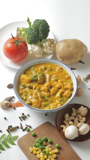 Mix Veg Curry Served with Rice or Whole Wheat Indian Bread  at Veganersworld 莘咖哩  in Tainan