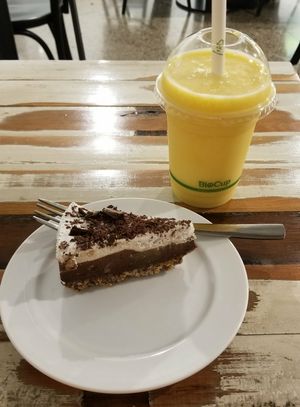 Chocolate cheesecake & Mango smoothie. at Munch in Palmerston North