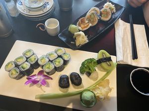 Nigiri and rolls (kiwi, shiitake, and broccoli) — (avocado rolls and tempura vegetable ) at Sushi One in Portland