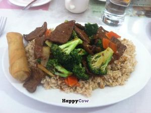 Spicy beef with broccoli, spring roll, and brown rice.  at Long Life Veggie House in Berkeley
