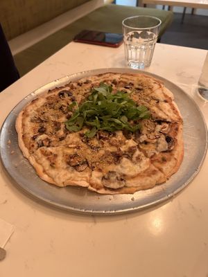 Pizza with mushrooms and truffle oil.  Good  at Community Restaurant in Oakville