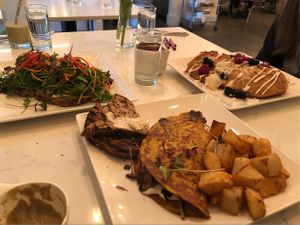 Omelet, avo toast and French Toast at Community Restaurant in Oakville