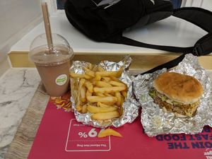 Double Louisiana Chick'n Burger, Large Fries with Peri Peri salt and a regular chocolate shake with peanut butter. at Miami Burger Test Kitchen in Reading