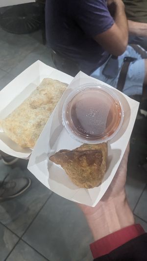 veggie burrito and samosa with plum sauce at Esperanto in Saratoga Springs