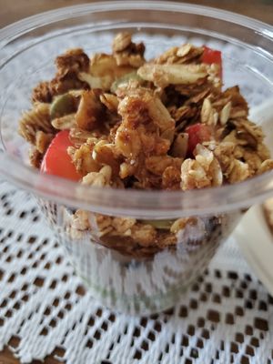 Granola and fresh berries on top of cashew parfait at ROOTED in Pleasant Hill
